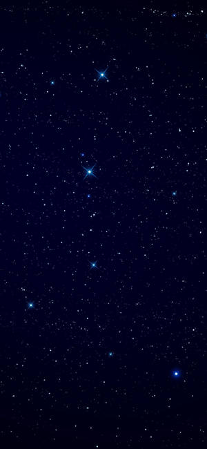 深藍色夜空，有許多星星和幾顆帶有星爆效果的明亮藍色星星。