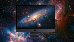 iMac電腦在宇宙星雲背景下顯示出色彩繽紛的螺旋星系。