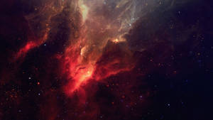 一個色彩繽紛的星雲，有紅橙色雲和深空中的星星。