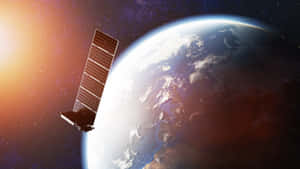 日出時衛星繞地球運行，背景有星星 — 日出 壁紙