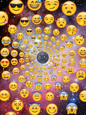 一個充滿旋轉表情符號面孔和中央月亮面孔的星系。