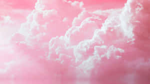 粉紅色的雲朵漂浮在柔和夢幻的天空中