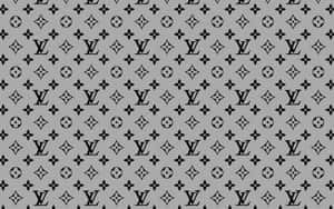 灰色背景，帶有重複的黑色 Louis Vuitton 標誌和花卉符號。