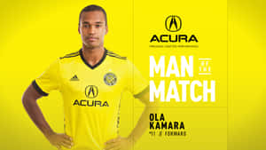 足球員奧拉·卡馬拉身穿黃色球衣獲選為Man of the Match。