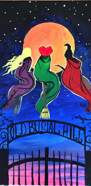 三個女巫騎著掃帚飛過刻有Old Burial Hill字樣的大門，背景是繁星點點的夜空。
