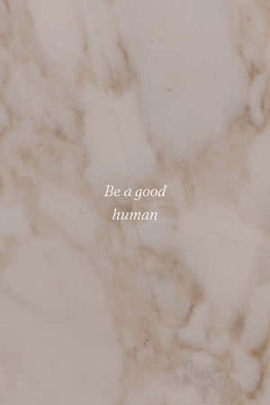奶油色大理石背景，上面有文字 be a good human。