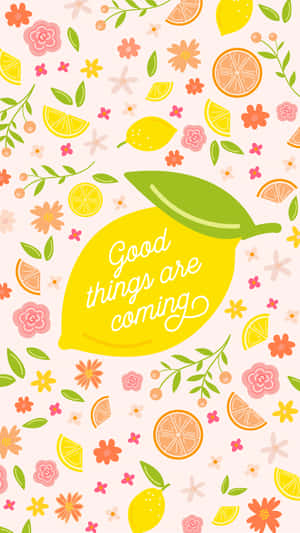 檸檬帶有文字 good things are coming，周圍環繞著花卉和柑橘切片。