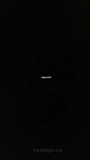 黑色背景上以白色文字寫著「depressed」。