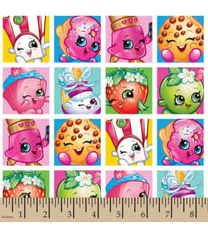 色彩繽紛嘅Shopkins角色網格，有大眼睛同笑容。 — 玩具總動員 壁紙