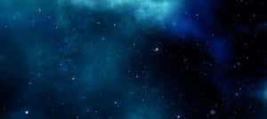 星空，有發光的藍色星雲雲團和散落的星星。 — 太空 壁紙