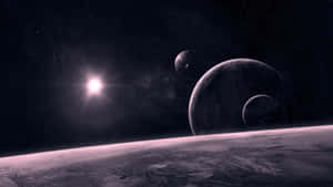 星空下，行星和衛星在荒蕪的景觀上投下長長的陰影。 — 夜空 壁紙