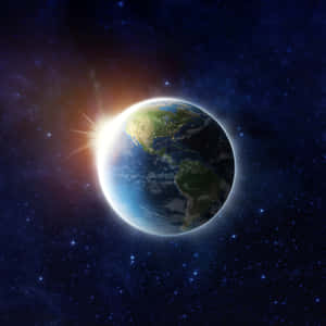 從太空看日出時的地球，發光的大陸和星空背景。 — 太空 壁紙