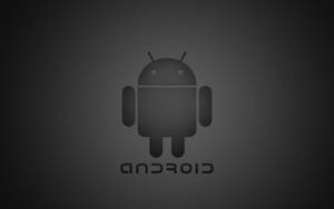 深色漸變背景上的Android機械人標誌，下方有android文字 — 安卓 壁紙