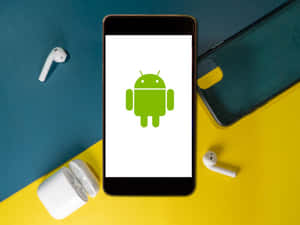 智能手機顯示Android標誌及無線耳機在色彩繽紛的背景上 — 安卓 壁紙