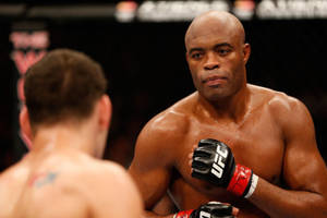 兩名MMA拳手在比賽期間於UFC八角籠中對峙。 — 紅色 壁紙