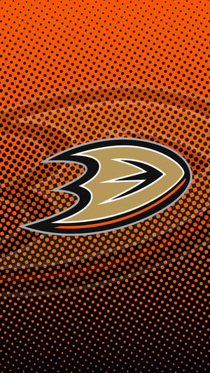 Anaheim Ducks 冰球隊標誌在橙色和黑色半色調背景上。
