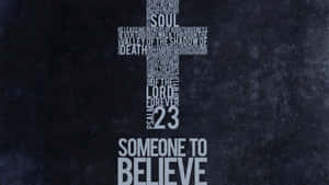 由詩篇23篇文字組成的十字架，下方有「SOMEONE TO BELIEVE」，置於深色背景上。