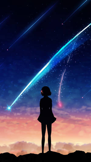 女孩在暮色天空中觀看流星
