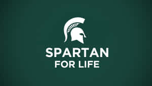 斯巴達頭盔標誌，帶有文字 Spartan for Life，在綠色背景上。