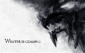 一隻帶有哥德字體 winter is coming 短語的威脅性冰龍。