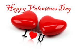 情人節的兩個紅色心形和 I love you 文字。