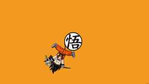 動漫角色悟空穿著橙色道袍倒立，帶有漢字符號。