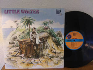 Little Walter 的專輯封面，男子在棕櫚樹下的海灘酒吧。 — 復古gif 壁紙