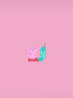 Peppa Pig 在粉紅色背景上拿著一個青綠色電話。