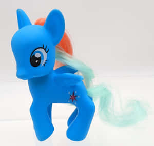 藍色 My Little Pony 玩具，有橙色和藍綠色的鬃毛和星星可愛標誌。 — 小馬寶莉 壁紙