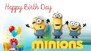 三個Minions用氣球和禮物慶祝生日。