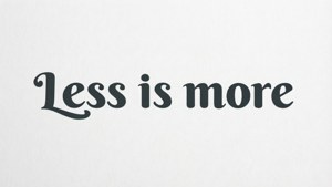 「less is more」以黑色手寫體顯示喺有紋理嘅白色背景上