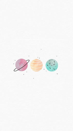 三個色彩繽紛的水彩星球漂浮在紋理白色背景的太空上。