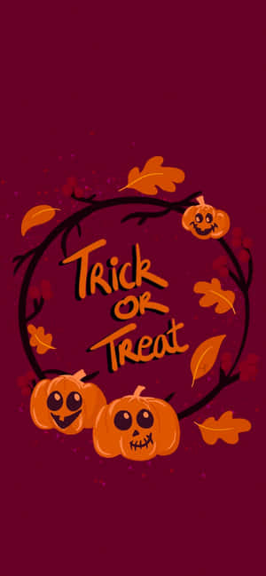 萬聖節南瓜和樹葉組成花環，帶有「Trick or Treat」文字。