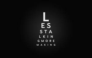 視力表風格文字，在深色背景上顯示 less stalking more making