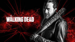 一個穿皮夾克的男人拿著帶刺的球棒，帶有紅色能量效果和標題 The Walking Dead。 — 火影忍者海報 壁紙