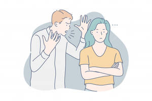 男人在爭吵中對交叉雙臂的女人大喊。