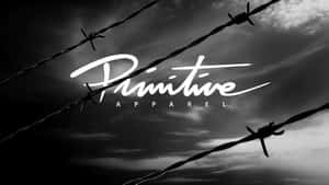 鐵絲網剪影映襯著暴風雨的天空，帶有 'Primitive Apparel' 標誌。