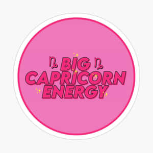 粉紅色圓形貼紙，上面有粗體文字寫著 Big Capricorn Energy 和星座符號。
