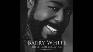 巴里·懷特在專輯封面上微笑，文字為The Ultimate Collection