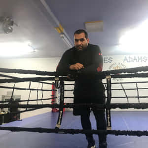 拳擊手在拳擊擂台內訓練，帶有 'Prince Adams Boxing' 標誌。