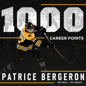 冰球運動員 Patrice Bergeron 慶祝職業生涯 1000 分，並顯示統計數據。 — 運動 壁紙