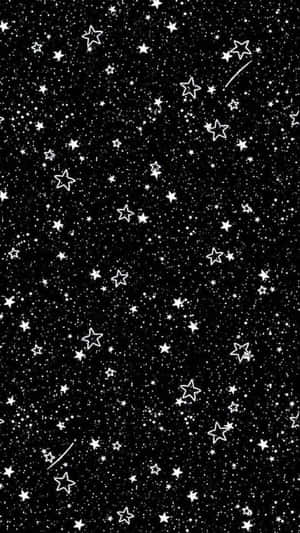 黑色背景上有白色輪廓星星和流星。