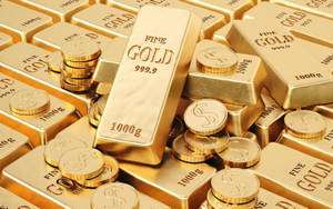 標有 fine gold 999.9 和 1000g 的金條和金幣堆 — 金色美學 GIF 壁紙