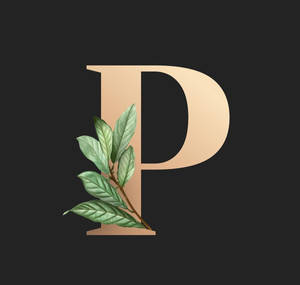 深色背景上的金色字母P與綠色葉子