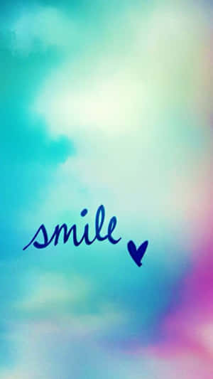彩色水彩背景上的 Smile 文字與心形 — 開心 GIF 壁紙