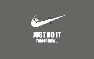 一個火柴人在Nike勾勾內小睡，並帶有文字just do it tomorrow。 — 藝術 壁紙
