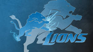 兩隻藍色獅子剪影碰撞，發出光芒的能量，下方有 'LIONS' 文字。