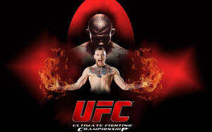UFC 戰士，火焰從他的手中噴出，背景是暗紅色。 — 鬼滅之刃面具 壁紙
