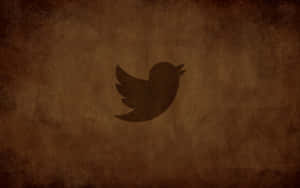 Twitter 鳥類標誌在有紋理的棕色背景上
