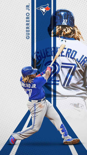 身穿藍白球衣的棒球手 Guerrero Jr. 揮棒。